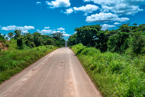 dirt road with potholes in Brazil.