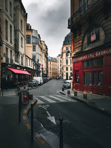 Paris, France - March 2016: A restaurant and a bakery on Rue du Mail. No elements added or removed from picture.