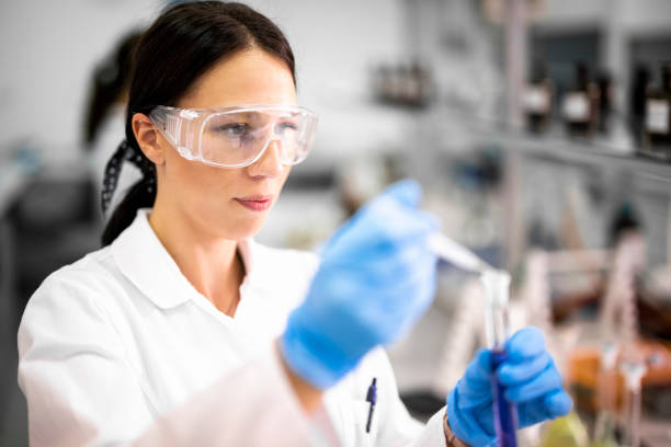 istock Brown haired female scientist seen using a pipette during some experiment in a laboratory 1443286766
