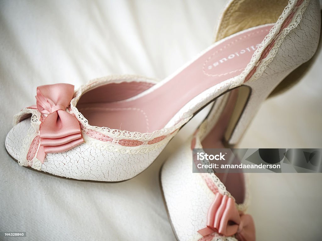 the bride wore pink pretty high heeled shoes worn by a summer bride Beauty In Nature Stock Photo
