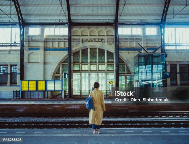Woman Waiting For The Train On Railway Station Stock Photo - Download Image Now - Railroad Station, Adult, Adults Only