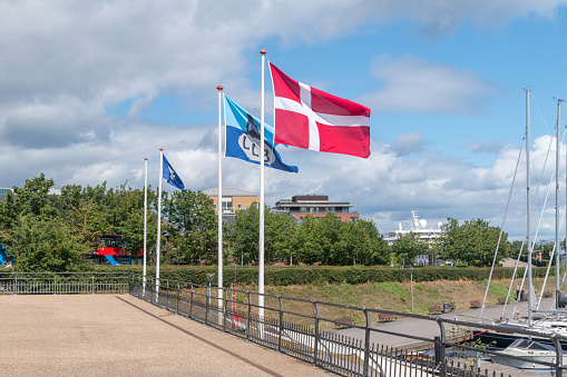 Copenhagen, Denmark - July 26, 2022: Flags at Langelinie Marina.