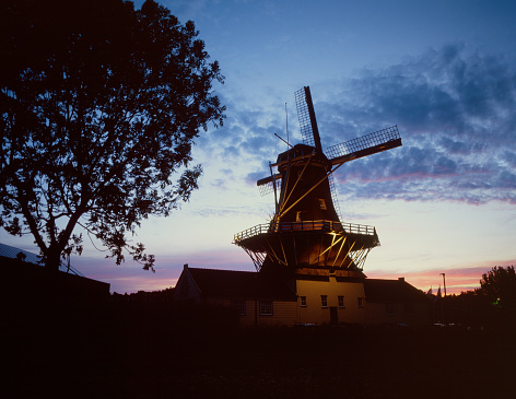 Sceic view of windmill in Netherlands at dusk