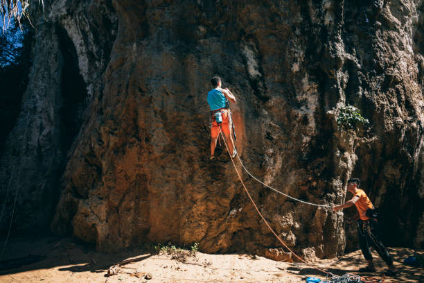 istock Adventurous rock climbers in nature 1443289648