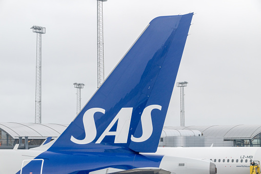 Copenhagen, Denmark - July 27, 2022: Logo of SAS, Scandinavian Airlines on plane tail.