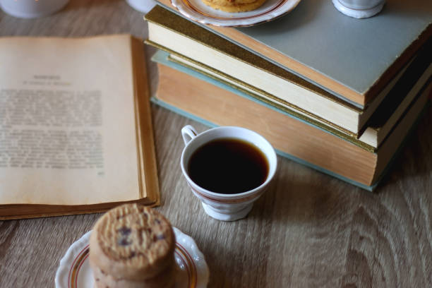 istock Cookies, Tea, Books and Candles 1443293575