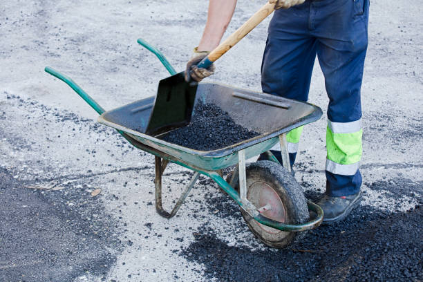 istock asphalt in wheelbarrow operator prepares mixture with uniform 1443298714