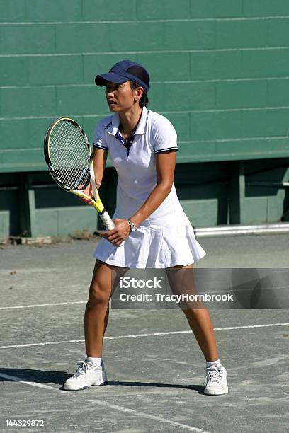 Ethnic Female Tennis Player Waiting For Serve Stock Photo - Download Image Now - Active Lifestyle, Activity, Adult