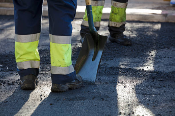 istock Partial view of uniform asphalt and paving road construction workers 1443298798