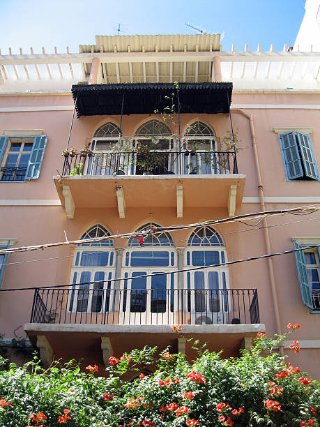 Lebanese facade Typical Lebanese traditional style architecture with arcade windows and the eternal electrical cable wires criss-crossing in front. alintal stock pictures, royalty-free photos & images