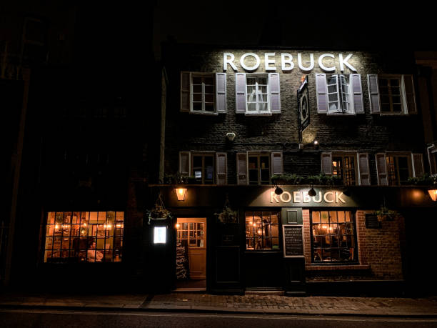 Facade of old traditional english pub Roebuck in Richmond, London