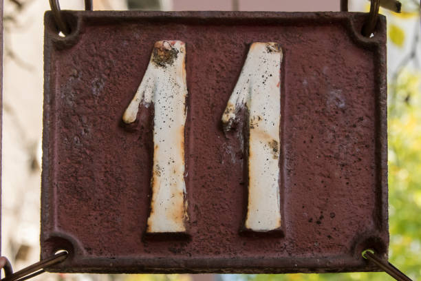 istock Old retro cast iron plate number 11 1443300257