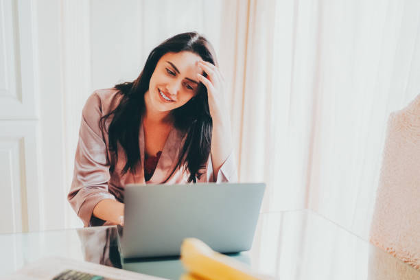 istock Young woman working at home 1443300473