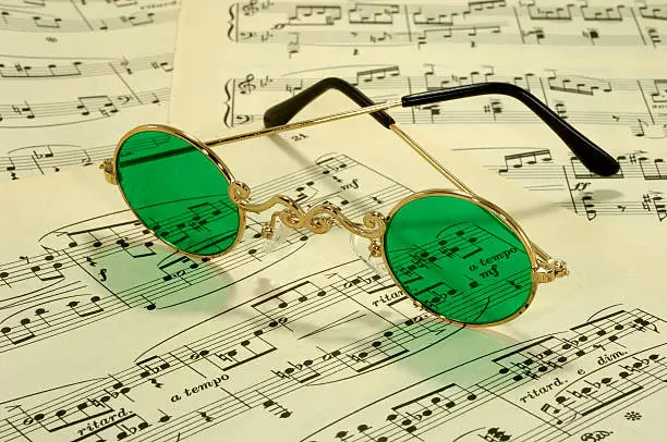 Photo of Sheetmusic and Vintage Glasses - Compose