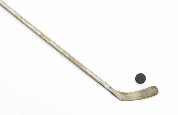 istock wooden hockey stick isolated on white background 1443302013