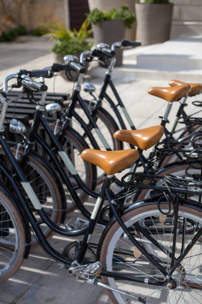 istock many rental bicycles displayed on street 1443303579