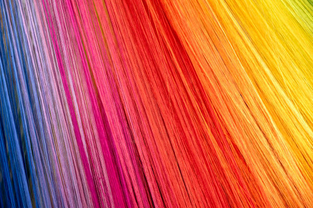 multicolored threads background stock photo