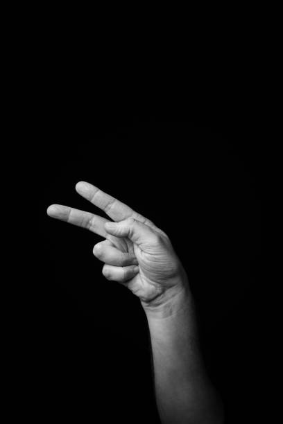 istock Hand demonstrating the French sign language letter 'K' with copy space (langue des signes française) 1443303672