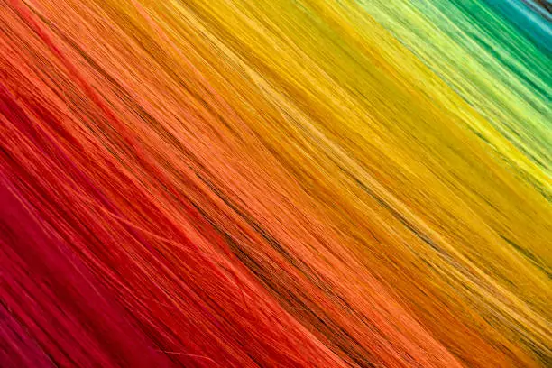 Photo of multicolored threads background