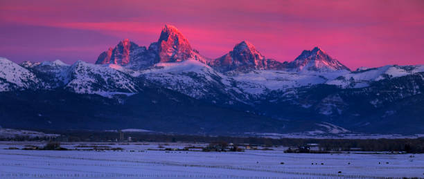 istock Tetons Teton Mountains in Winter Snow and Trees with Reflection in River 1443304558
