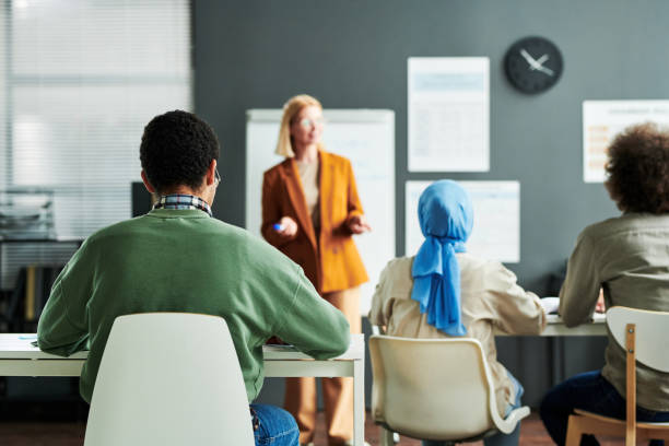 istock Rear view of multicultural audience attending lesson of foreign language 1443305457