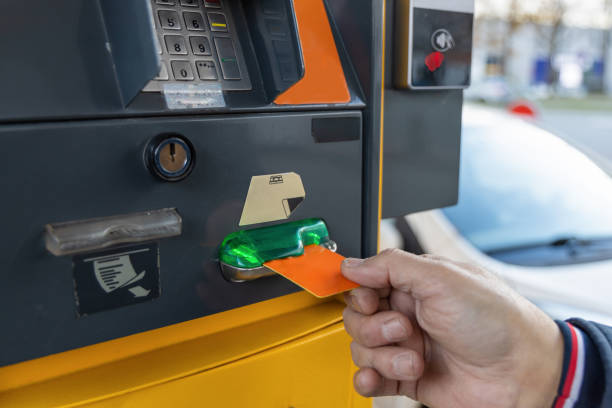 istock Buying gasoline at a gas station. 1443306851
