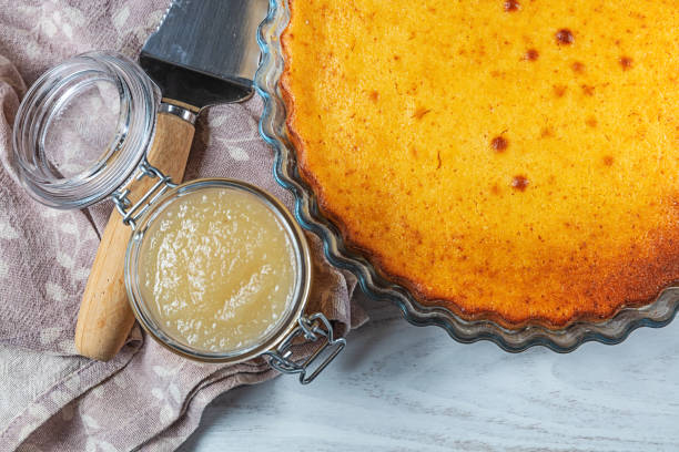 istock apple cake seen from above with applesauce and spatula. 1443307960