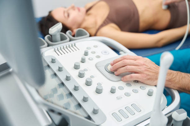 Ultrasound examination medical specialist conducts a check in a woman stock photo