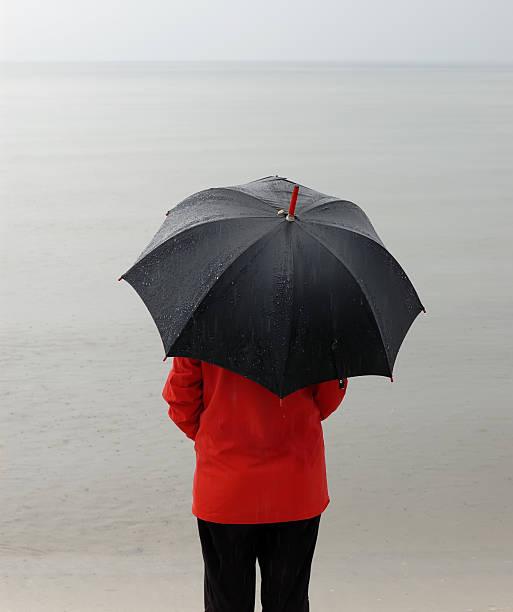 istock woman on the beach 144331227