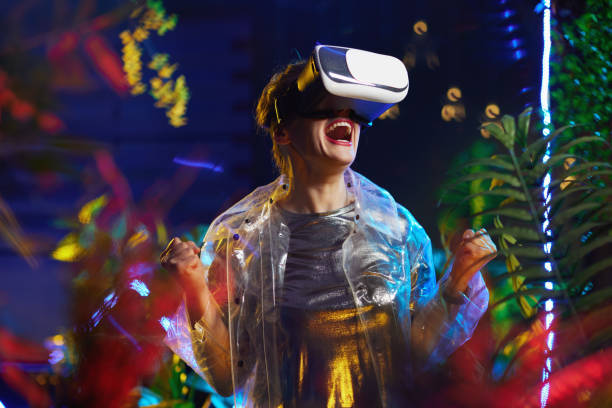 istock cheerful woman rejoicing in virtual reality 1443312822