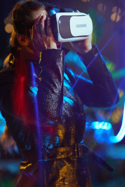 istock trendy 40 years old woman in virtual reality in vr headset 1443312836
