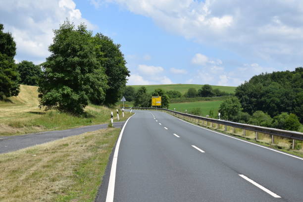 istock country road in summer 1443314255