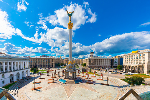 Kyiv, Ukraine - April 1, 2021: Monument to Globe in Kyiv, Ukraine. Zero kilometer sign