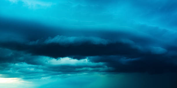 Scary cloud. Storm. Dark dramatic sky. Thunderstorm. Dangerous heaven background. Rainy weather. Rain. Nature background. Rainy season