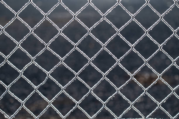Metal net covered by hoarfrost