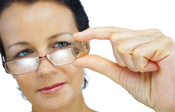 moeda - women savings uk coin imagens e fotografias de stock