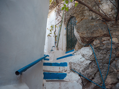 Marmaris is resort town on Turkish Riviera, also known as Turquoise Coast. Beautiful streets of old Marmaris. Narrow streets with stairs among houses with white bricks, green plants and flowers