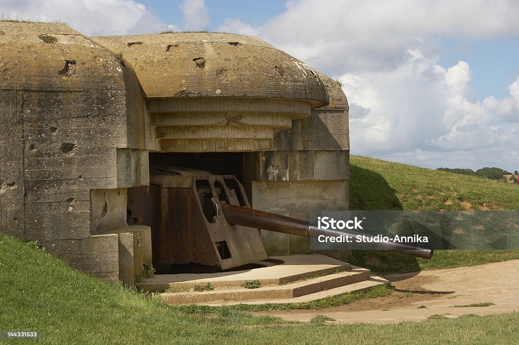 War guns Remains of a German bunker of World War II at Longues-sur-Mer, Normandy, France 1944 Stock Photo