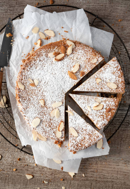 istock Almond cake overhead shot with three slices 1443315737