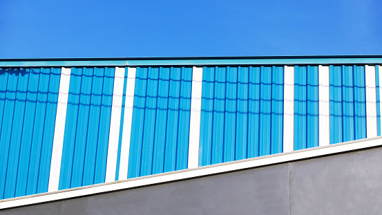 Blue rooftop detail in sky