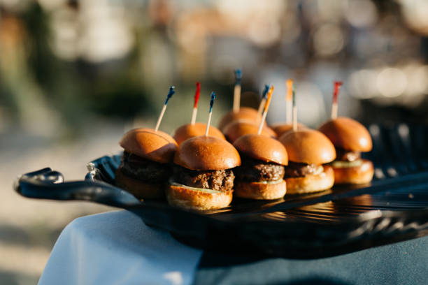 istock A platter of beef sliders on a table outside for an event 1443316863
