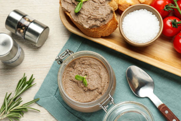 istock Flat lay composition with delicious liver pate on white wooden table 1443317345