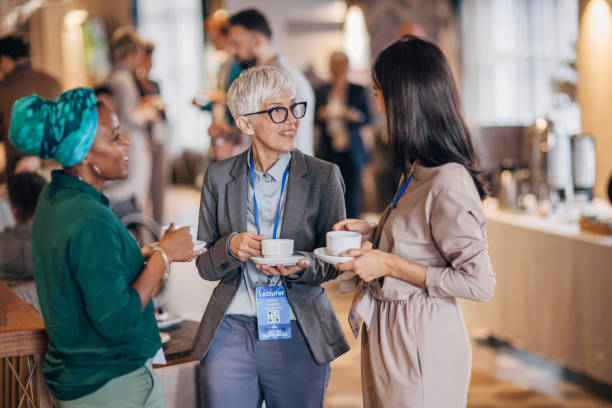 istock Businesswomen at convention 1443318222
