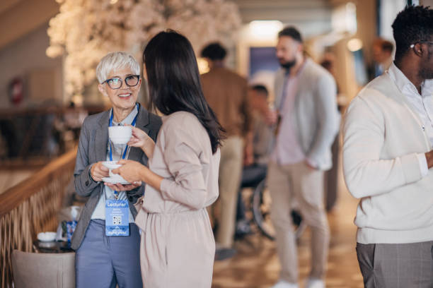 istock Businesswomen at convention 1443318266