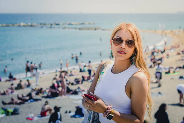 Latin woman on the beach stock photo
