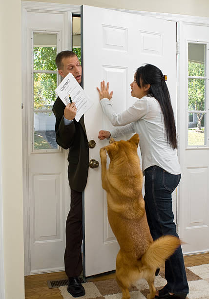 Annoying salesman Dealing with tenacious and annoying street salesman door to door salesperson photos stock pictures, royalty-free photos & images