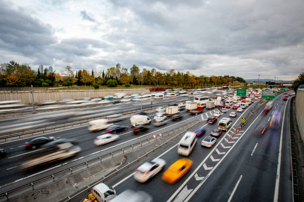 istock Fast moving traffic on the highway 1443319137