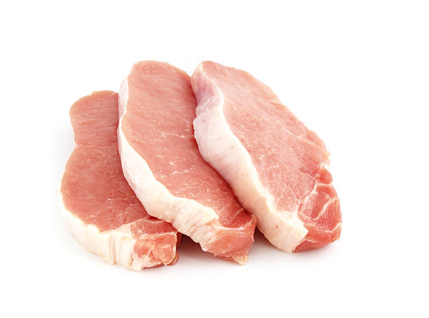 istock A bunch of uncooked pork chops  144332035