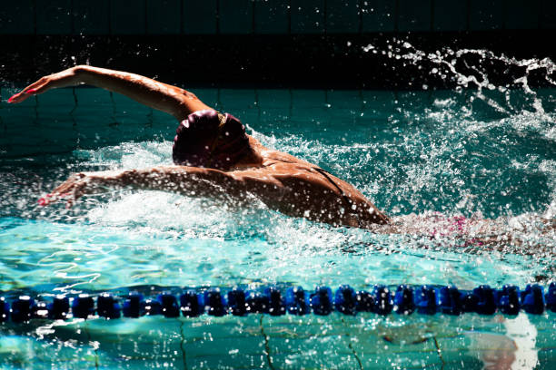 istock Young woman swimmer training in the pool. 1443321563