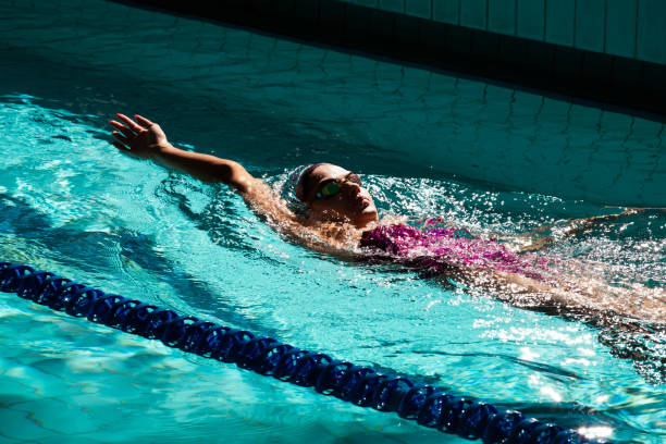 istock Young woman swimmer training in the pool. 1443322626